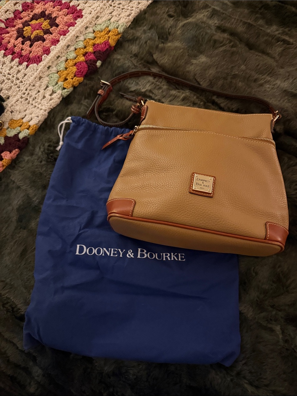 Dooney & Bourke Pebble Leather Crossbody in the color sand I believe